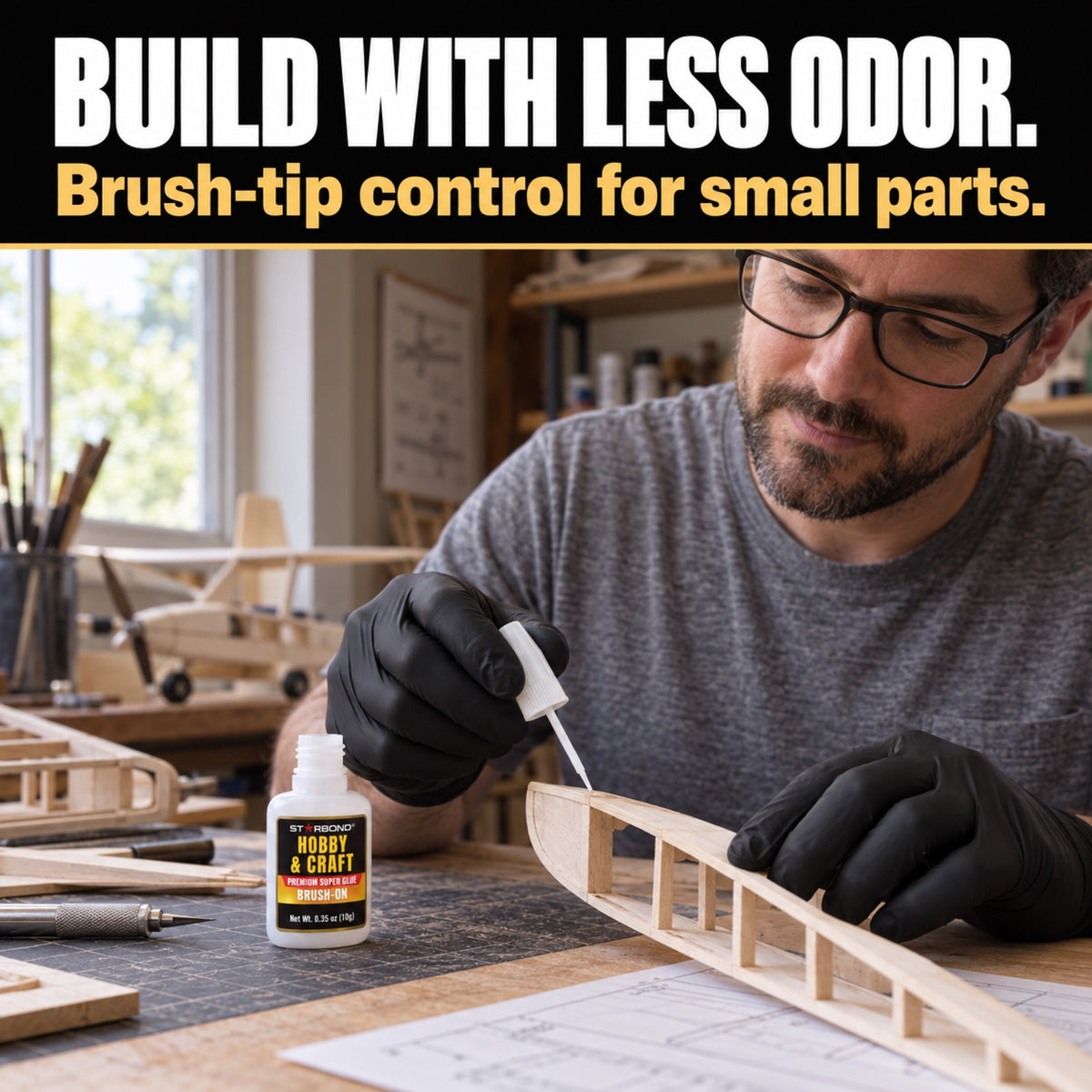 Illustrative scene of an adult using Starbond Hobby & Craft Brush-On glue on a small balsa model at a naturally lit craft bench. BUILD WITH LESS ODOR. Brush-tip control for small parts.