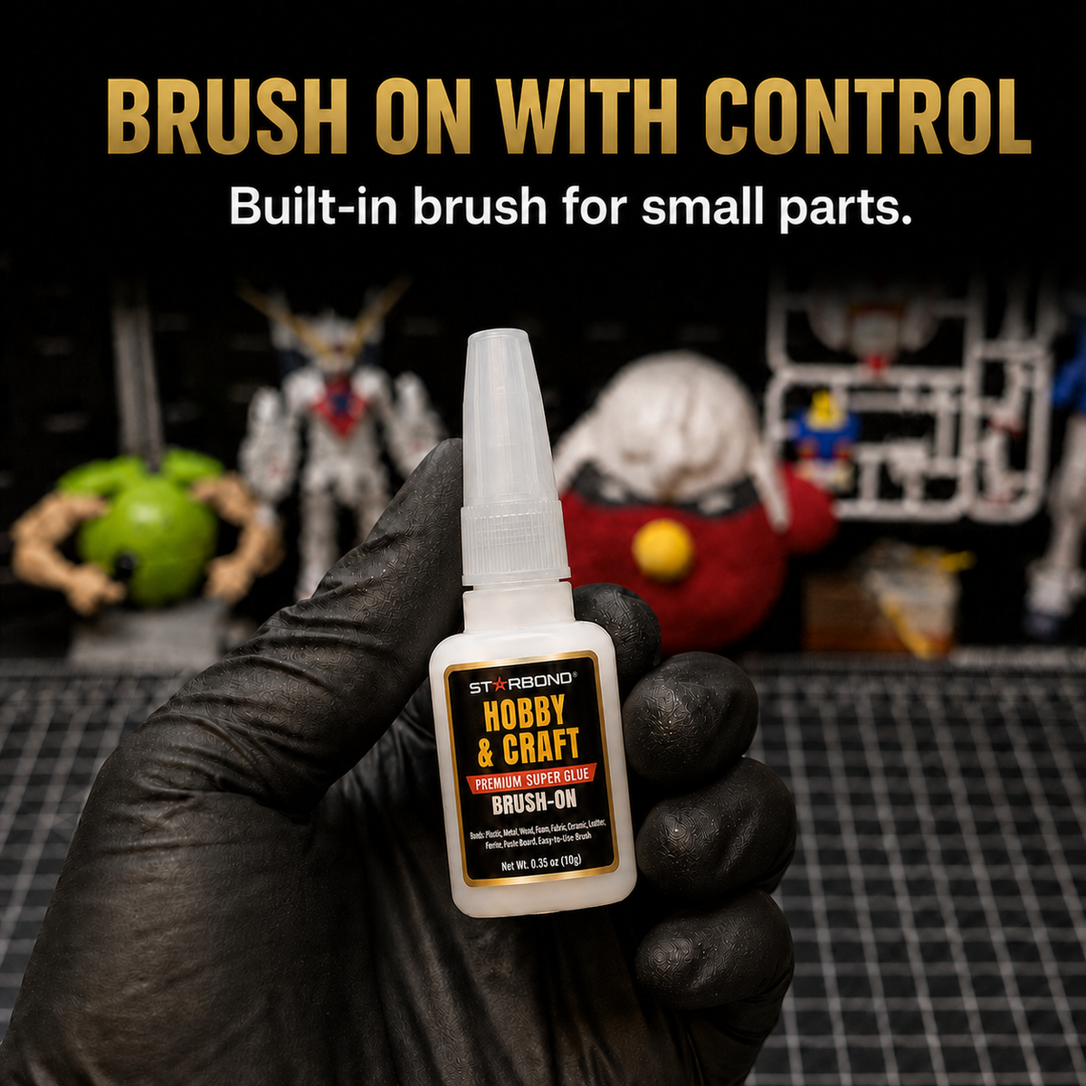 Starbond Hobby & Craft Brush-On Super Glue held in a gloved hand. Brush on with control. Built-in brush for small parts.